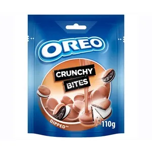 OREO Mini crunchy bites galletas de cacao rellenas de crema sabor vainilla y cubiertas de chocolate con leche 110 g.