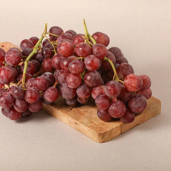 Uva rosada con semillas