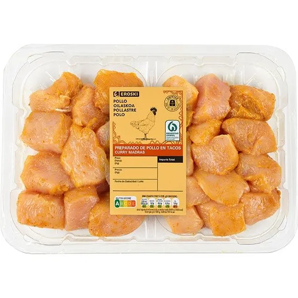 Pechuga de pollo en tacos al curry EROSKI, bandeja aprox. 500 g