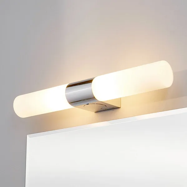 Lámpara de espejo Ziva de Lindby, enchufe, blanco, cristal, IP44