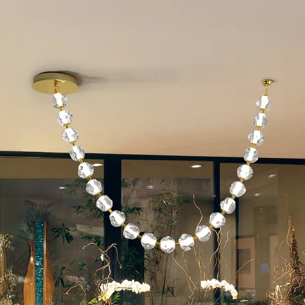 Schuller Valencia Lámpara colgante LED Zaria, 21 luces, dorada, transparente, metal, acrílico