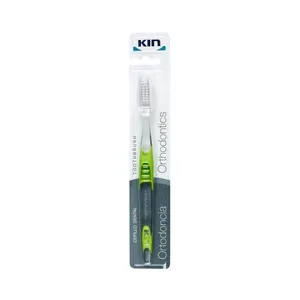 KIN Cepillo dental con filamentos en "V" que facilitan la limpieza alrededor de los brackets.